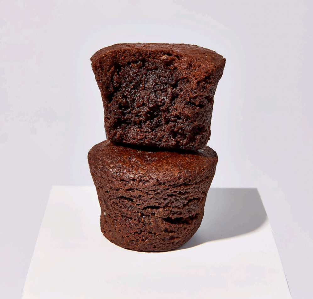 Byte'm brownies classic brownies stacked up. 